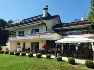 Opportunité à saisir! Villa avec piscine au coeur de Pully à l’abri des regards image 1