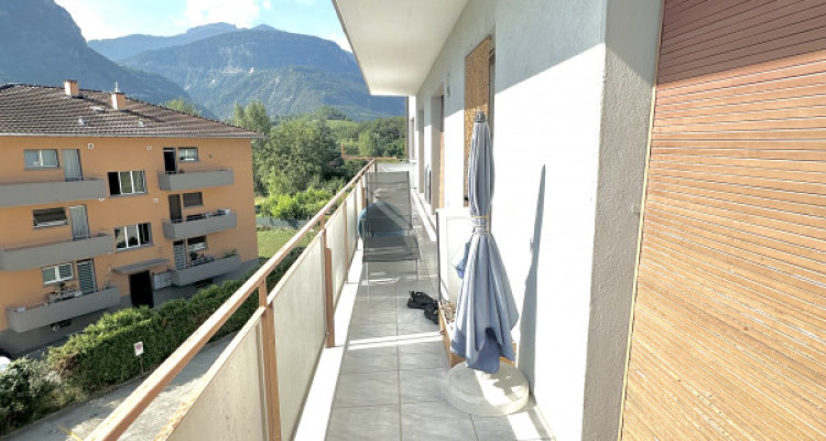 A vendre à Sierre : charmant appartement de 3,5 pièces avec balcon traversant image 4