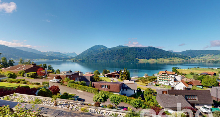 Exklusives Terrassenhaus mit atemberaubendem Berg- und Seeblick image 4