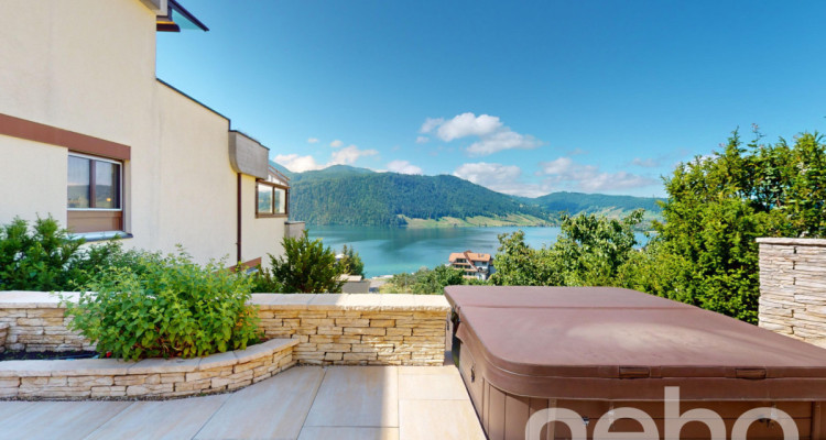 Exklusives Terrassenhaus mit atemberaubendem Berg- und Seeblick image 5