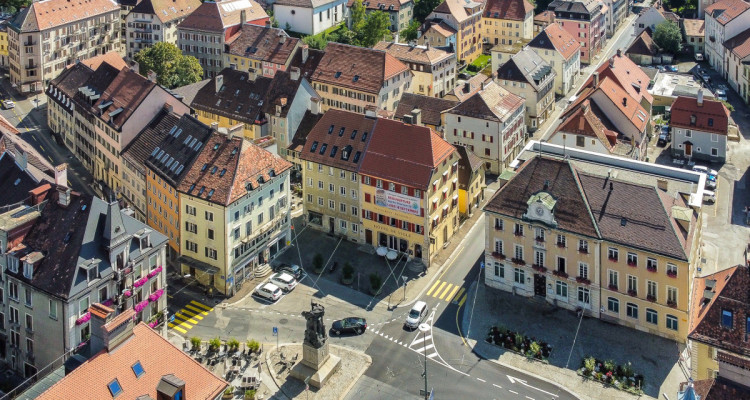 Immeuble de rendement avec beaucoup de potentiel au coeur de la ville image 1