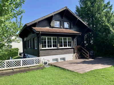 Chalet de 5.5 pièces dans un écrin de verdure à moins de 5 minutes de Gland!  image 1