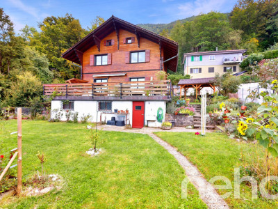 Chalet dexception avec vue panoramique sur le lac et les Alpes image 1