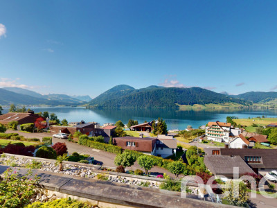 Schönes Terrassenhaus mit atemberaubendem Berg- und Seeblick image 1