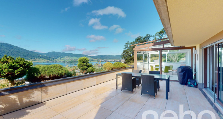 Schönes Terrassenhaus mit atemberaubendem Berg- und Seeblick image 4