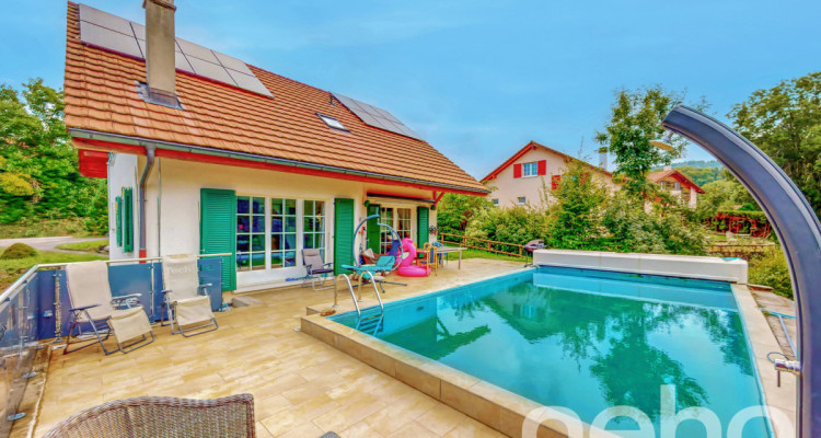 Maison familiale avec piscine extérieure et atelier au sous-sol ! image 1