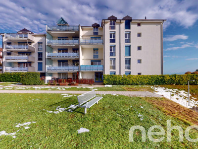 Appartement en duplex avec balcon et vue dégagée à Corcelles image 1