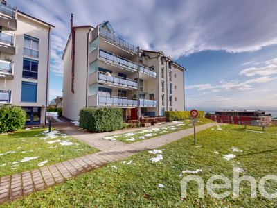 Appartement en duplex avec balcon et vue dégagée à Corcelles image 1