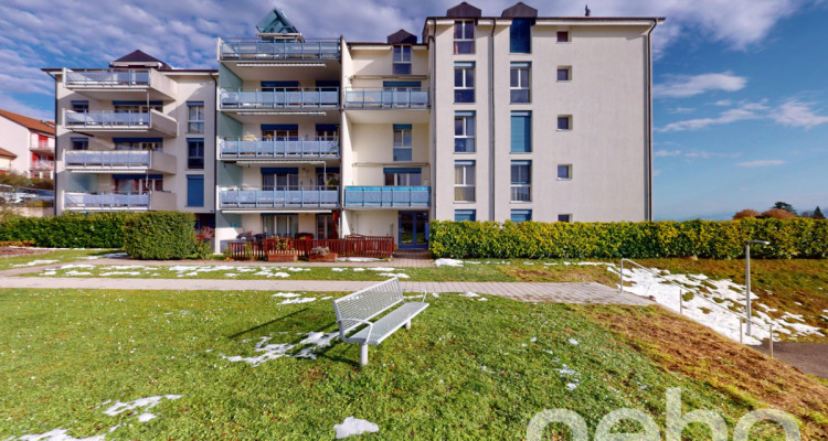 Appartement en duplex avec balcon et vue dégagée à Corcelles image 1