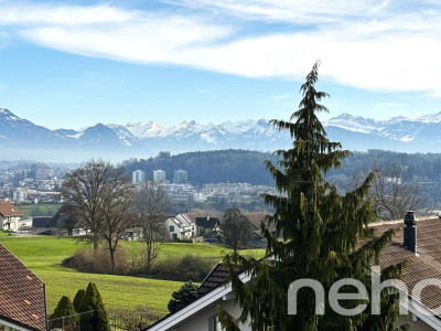 Dachwohnung mit fantastischer Bergsicht und einem separaten Studio image 1