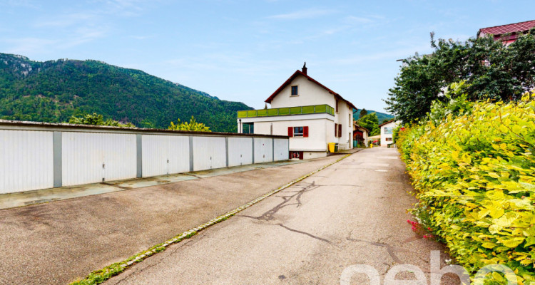 Immeuble de rendement avec 13 garages dont terrain constructible! image 3