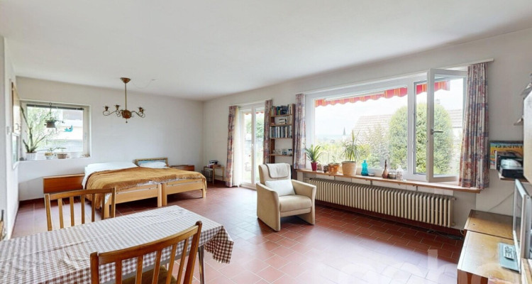 4-Zimmerhaus mit Cheminée und Weitblick in familienfreundlicher Lage image 3