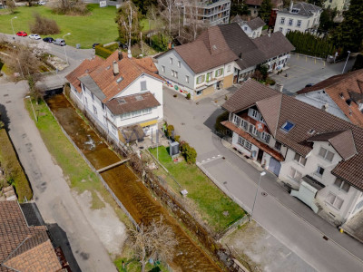 Attraktives Mehrfamilienhaus mit Entwicklungsspielraum in zentraler Lage von Reinach image 2