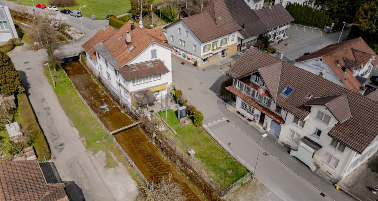 Attraktives Mehrfamilienhaus mit Entwicklungsspielraum in zentraler Lage von Reinach image 2
