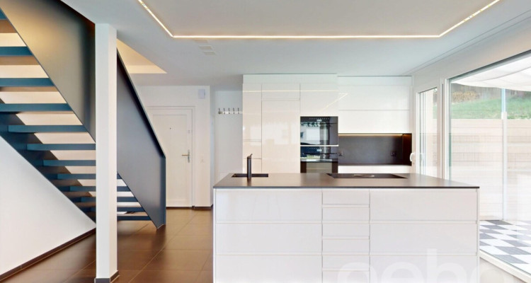 Moderne und renovierte Maisonette-Wohnung mit Gartensitzplatz image 4