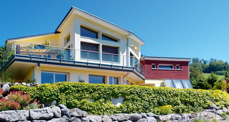 Exklusives Architektenhaus, optimale Berg-Seesicht und Schwimmteich image 1