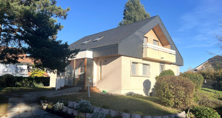 Maison individuelle de 6.5 pièces avec terrasse et jardin image 1