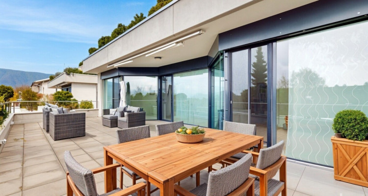 Appartement-terrasse lumineux et élégant avec vue à Gampelen image 11