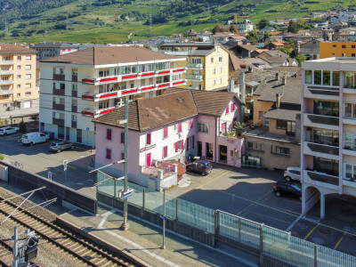 Immeuble à fort potentiel au centre de Saxon, face à la gare image 4