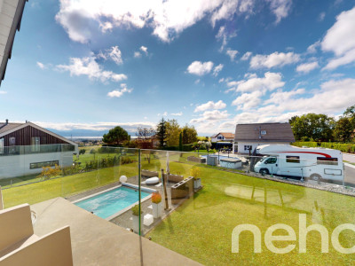 Maison de rêve avec piscine chauffée et vue lac ! image 12