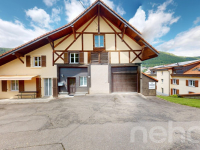 Grande maison rénovée avec vaste jardin à St-Imier image 1