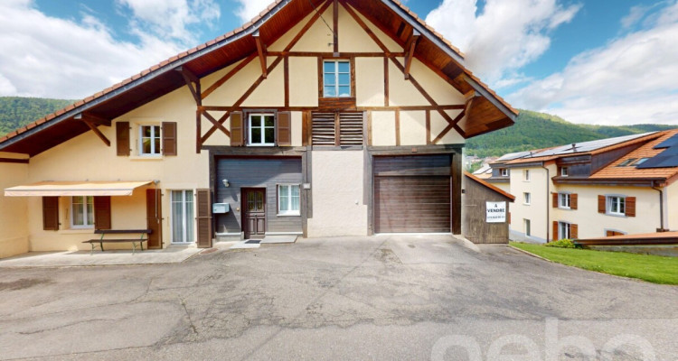 Grande maison rénovée avec vaste jardin à St-Imier image 1