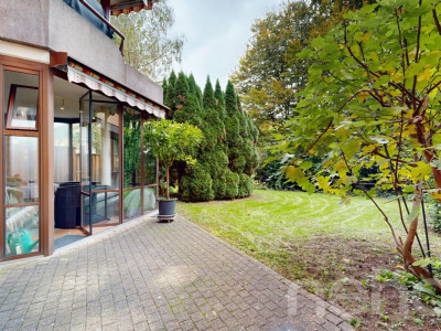 Gartenwohnung mit Wintergarten und Bastelraum an zentraler Lage image 3