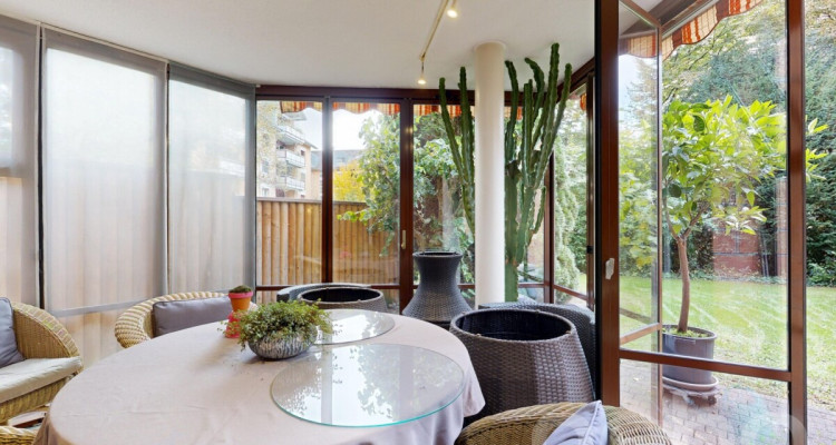 Gartenwohnung mit Wintergarten und Bastelraum an zentraler Lage image 2