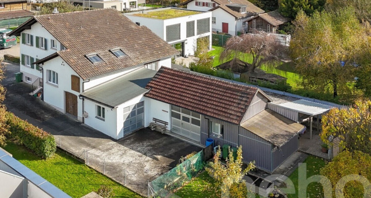 Familiendomiziel mit Dachgeschosswohnung, Werkstatt und Schopf image 2