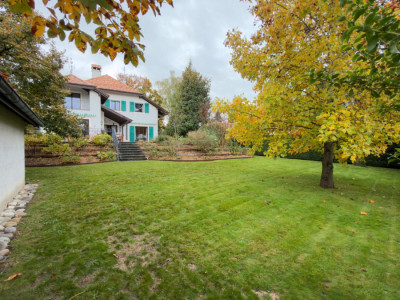 Maison genevoise de 14 pièces où le charme dantan rencontre le confort contemporain image 2