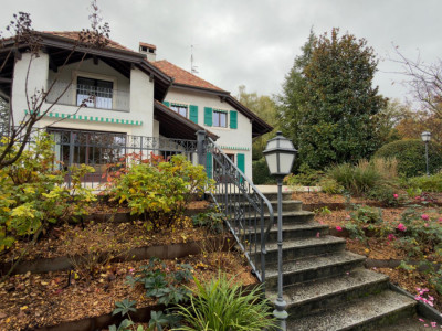 Maison genevoise de 14 pièces où le charme dantan rencontre le confort contemporain image 1