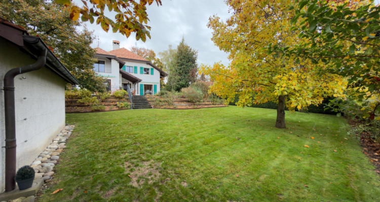 Maison genevoise de 14 pièces où le charme dantan rencontre le confort contemporain image 2