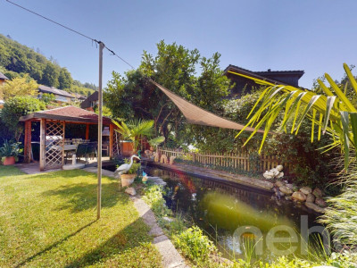 5.5-Zi.-Einfamilienhaus mit Garten, Teich & vielseitigen Optionen image 11