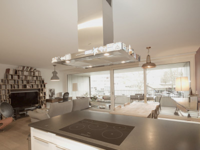 5.5-room THPE apartment with balcony, indoor parking and wellness access image 2