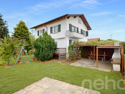 Belle maison bi-familiale avec garage intégré et jardin ensoleillé ! image 1