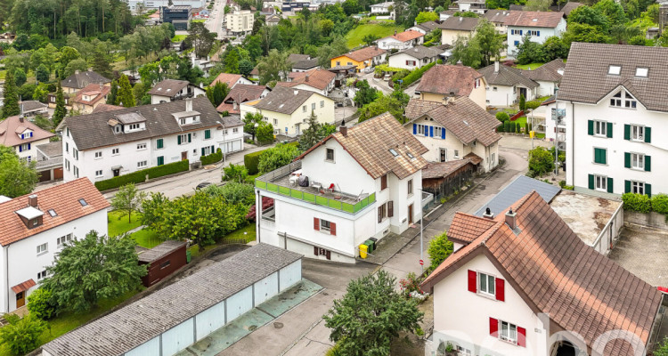 Immeuble de rendement | 13 garages | et Terrain constructible ! image 12