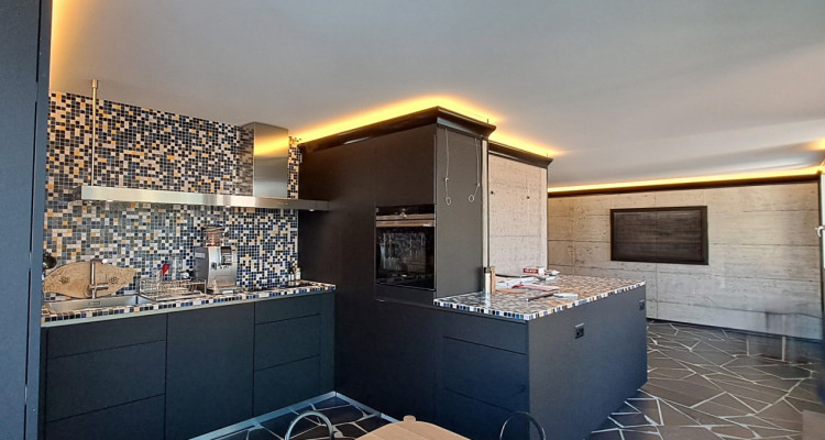 Attique d’exception de 3.5 pièces avec terrasse panoramique et garage image 4