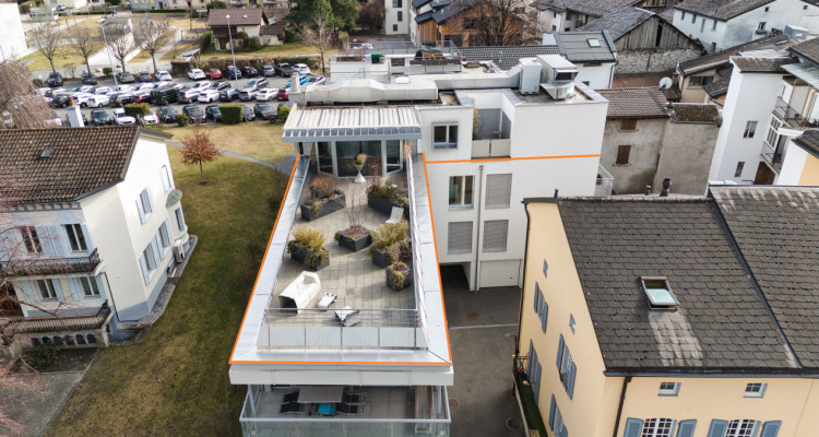 Attique d’exception de 3.5 pièces avec terrasse panoramique et garage image 1