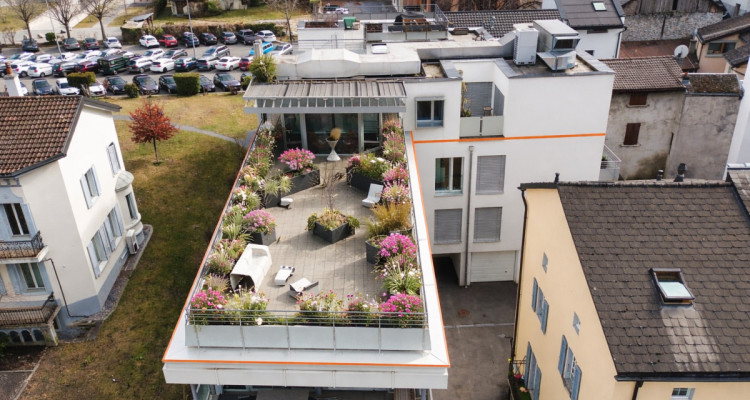 Attique d’exception de 3.5 pièces avec terrasse panoramique et garage image 1