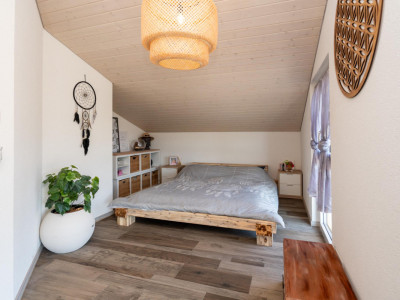 Propriété multifamiliale contemporaine au Val-de-Ruz, nichée dans un environnement verdoyant et calme image 11