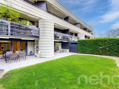 Appartement en rez-de-jardin avec terrasse et jardin à Prangins image 1