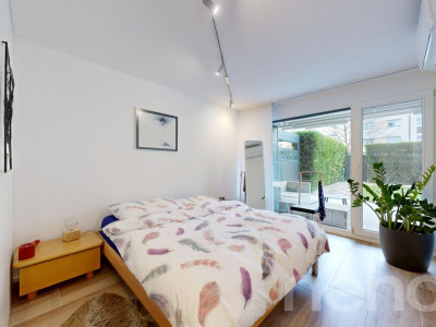 Appartement en rez-de-jardin avec terrasse et jardin à Prangins image 7