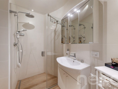 Appartement en rez-de-jardin avec terrasse et jardin à Prangins image 9