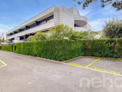 Appartement en rez-de-jardin avec terrasse et jardin à Prangins image 11