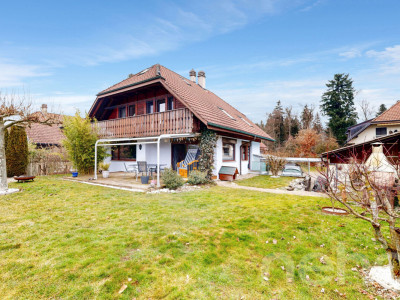 Einfamilienhaus im ruhigen Familienquartier mit grossem Umschwung image 2