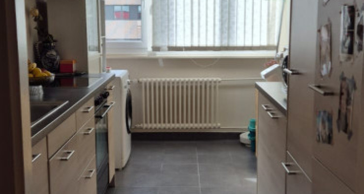 GENÈVE CENTRE – 4 PIÈCES AVEC BALCON & BOX FERMÉ image 4