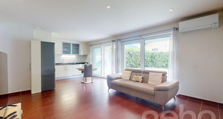 Exclusif: appartement 3.5 pièces avec terrasse couverte et jardin image 3