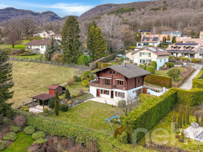 Une opportunité rare : chalet spacieux à fort potentiel à Genolier image 1