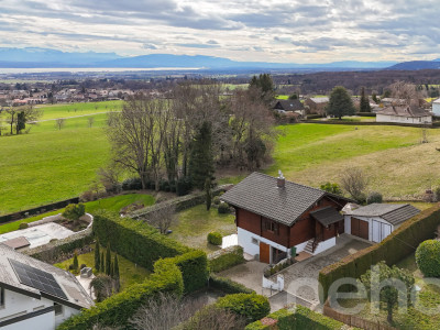 Une opportunité rare : chalet spacieux à fort potentiel à Genolier image 11