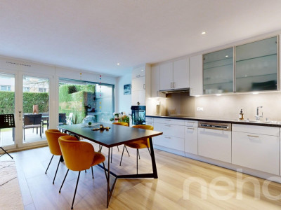 Appartement en rez-de-jardin avec terrasse et jardin à Prangins image 3